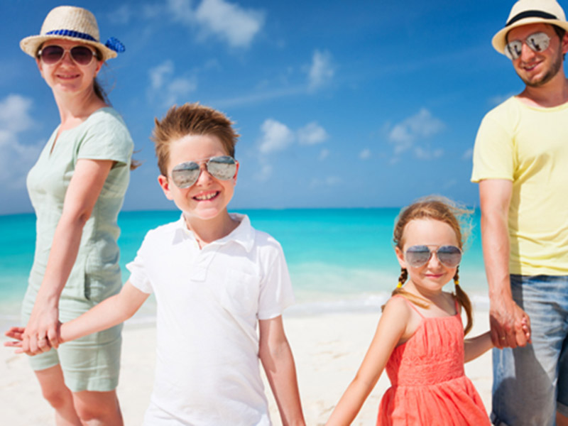 family enjoying on the beach