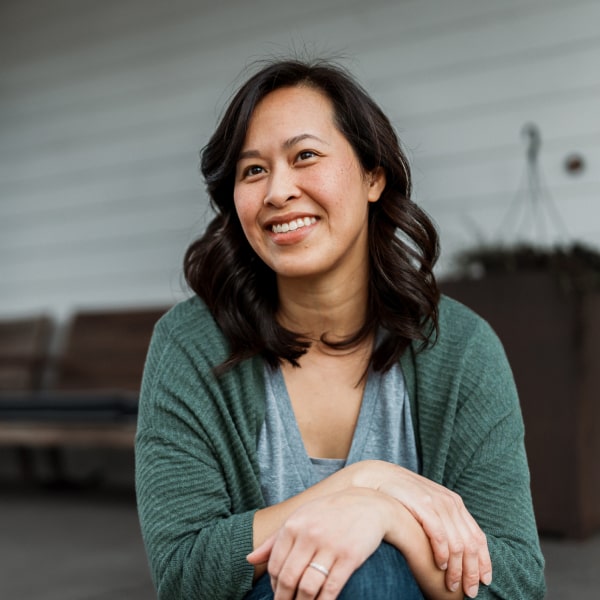 woman smiling on porch