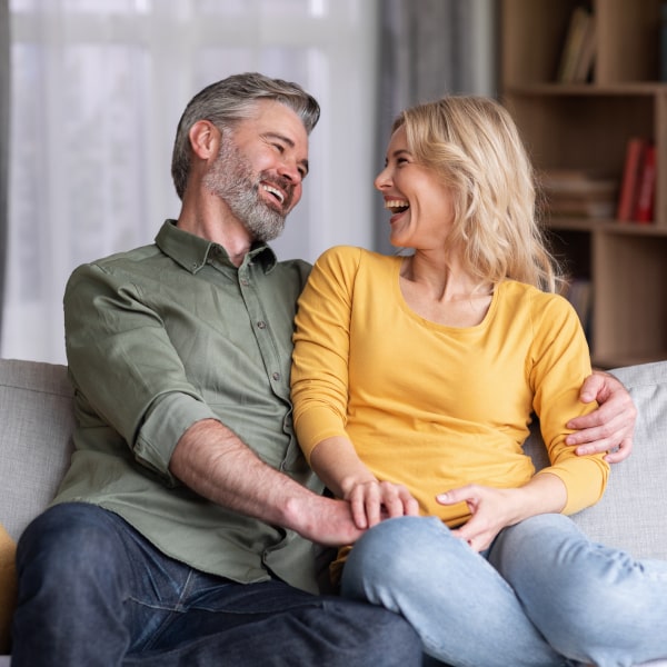 Close-up view of couple displaying cosmetic teeth bonding in Florence, KY